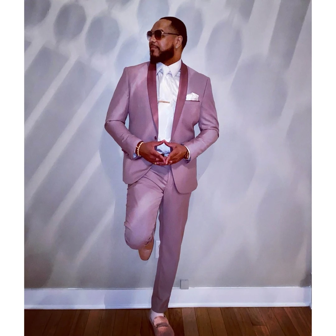 Client in dusty rose suit with burgundy satin lapel and matching loafers
