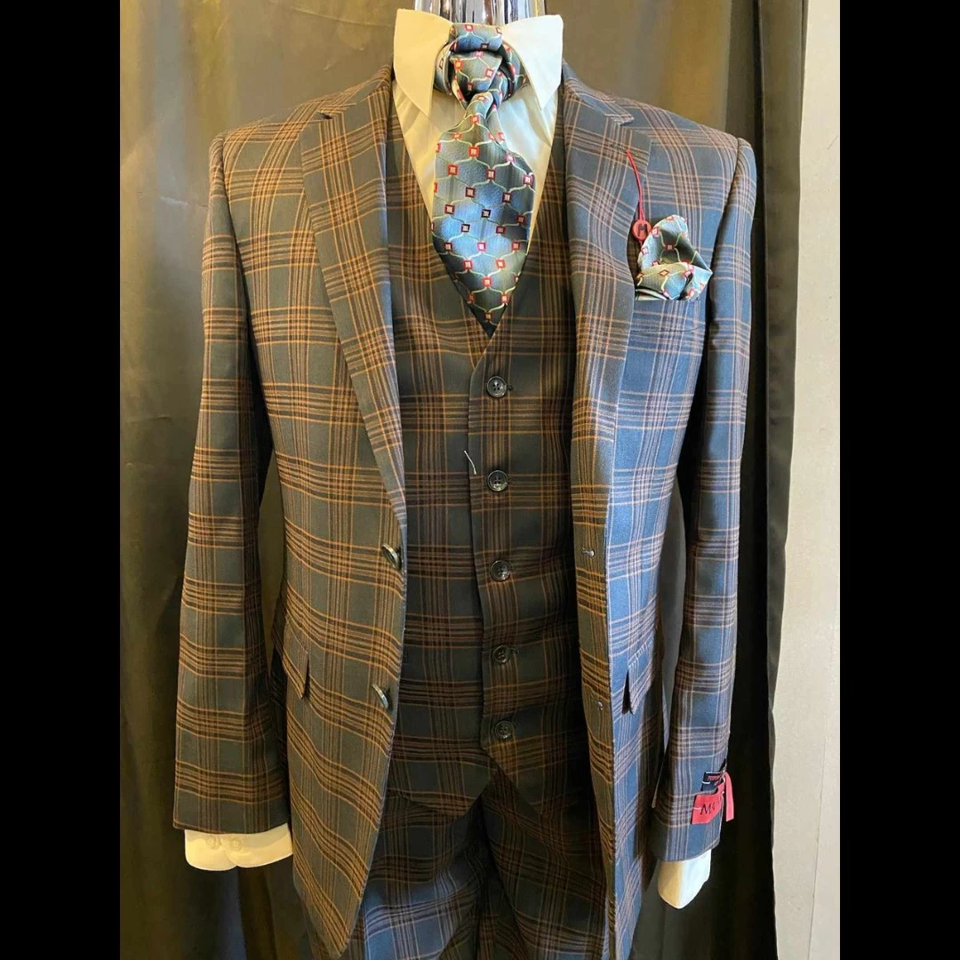Blue and brown plaid three-piece suit with patterned tie